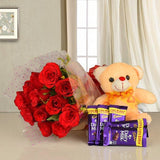 12 Red Roses- 5 Cadbury's DairyMilk Chocolates (13.2 gms each)- 1 Teddy Bear (6 inches)