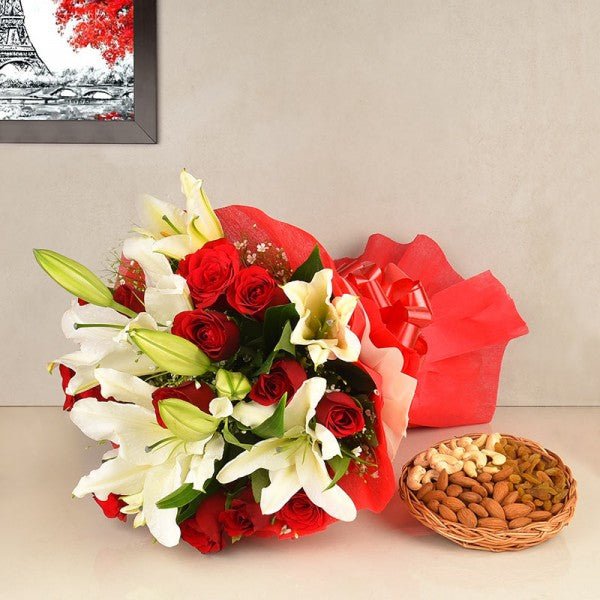 Bouquet of 12 Red Roses and 4 White Oriental Lilies- 250 gm Assorted DryFruits(Almond,Cashew nut,Raisins)