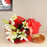 Bouquet of 12 Red Roses and 4 White Oriental Lilies- 250 gm Assorted DryFruits(Almond,Cashew nut,Raisins)