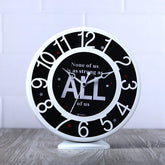 None of Us is as Strong as All of Us Clock