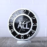 None of Us is as Strong as All of Us Clock