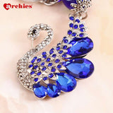 Archies Blue And White Stone Studded Peacock Evil Eye Keychain