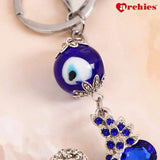 Archies Blue And White Stone Studded Peacock Evil Eye Keychain