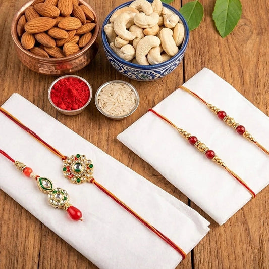 Set Of 4 Kundan Rakhi With Dry Fruits Potli