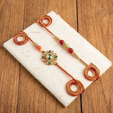 Set Of 4 Kundan Rakhi With Dry Fruits Potli