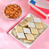 Delightful Rajasthani Rakhi Set Hamper with Kaju Katli, Lindt Extra Creamy Chocolate, Ferrero Rocher & Almond