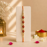 Set Of 2 Pearl And Rudraksha Rakhi With Cadbury Dairy Milk