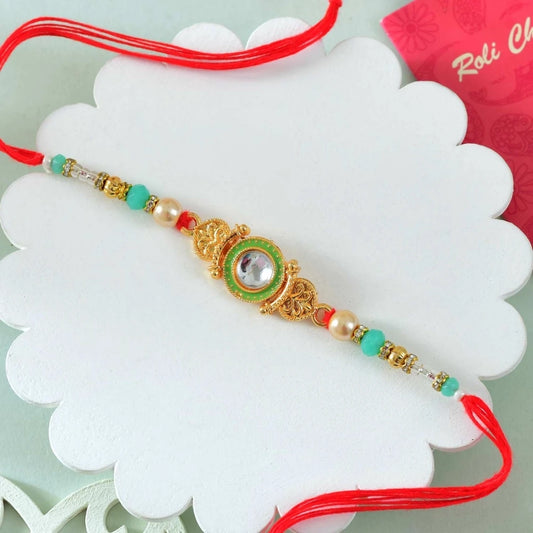 Vivid Kundan Rakhi Hamper with Kaju Katli, Besan Laddoo & Snickers