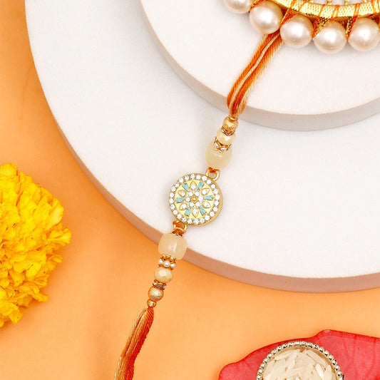 Floral Kundan Medallion Rakhi with Dry Fruits