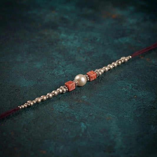 Velvety Pearl Rakhi With Rasgulla Delights