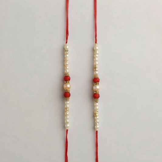 Set Of 2 Pearl Rakhi With Money Plant