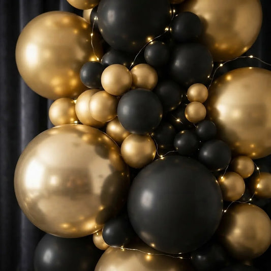 Black Sequin Wall with Gold & Black Balloon Decor