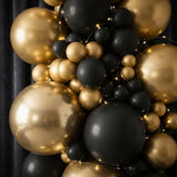 Black Sequin Wall with Gold & Black Balloon Decor