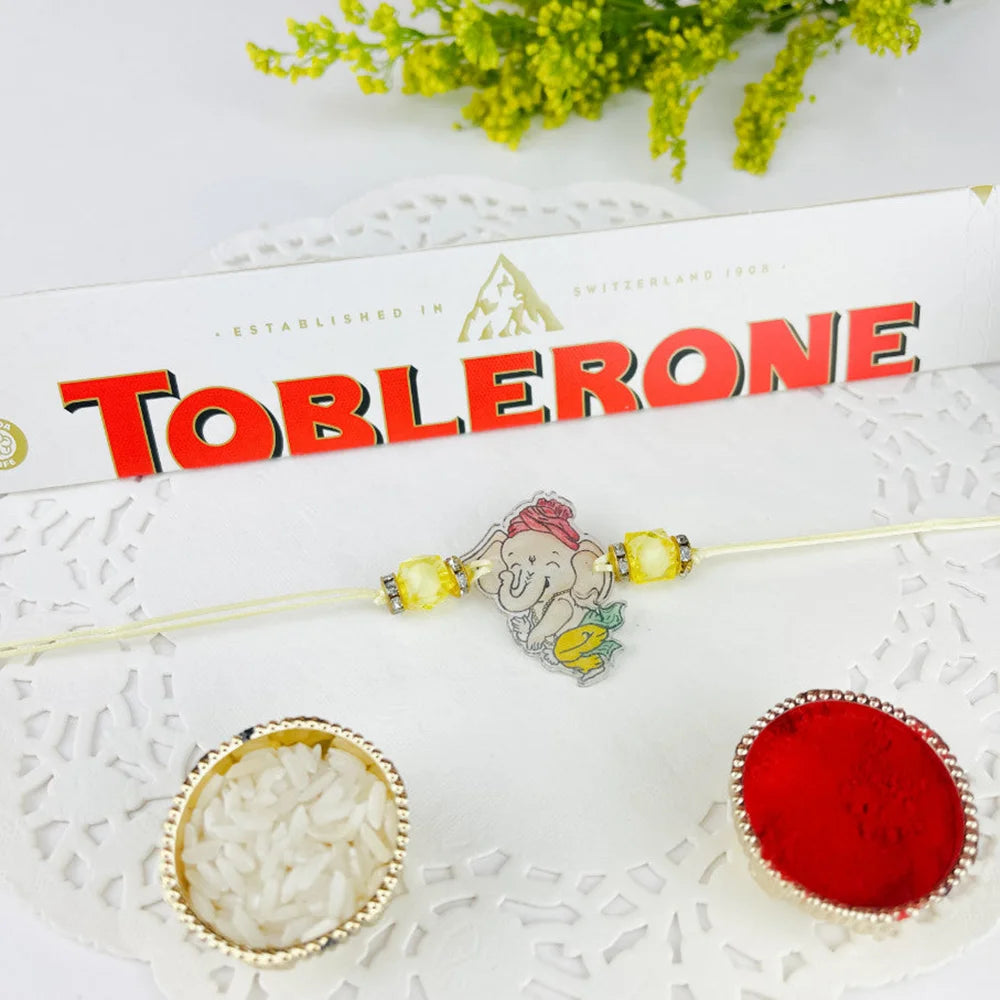 Kids Ganesh Rakhi With Toblerone