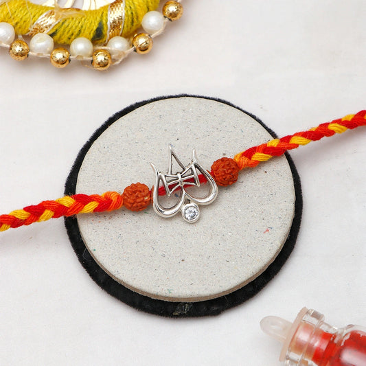 Archies Silver Shiva Trishul Rakhi with Besan Ladoo and Dry Fruits