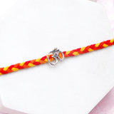 Archies  Om Charm Braided Silver Rakhi