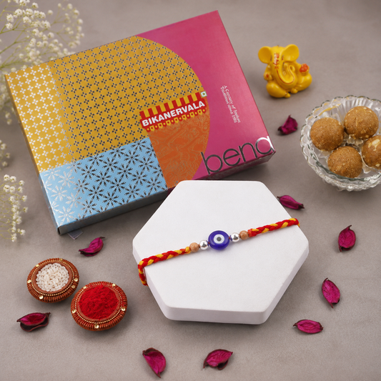 Archies Silver Evil Eye Beaded Rakhi with Besan Laddo