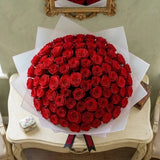 Grand 100 Red Roses Bouquet in White Premium Paper