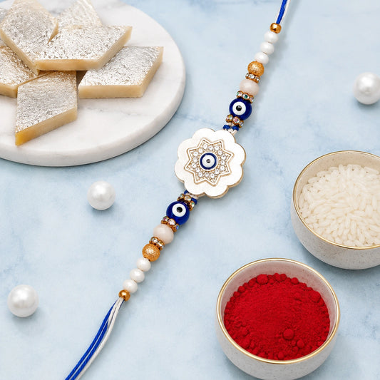 Evil Eye Star Flower Rakhi with Kaju Katli