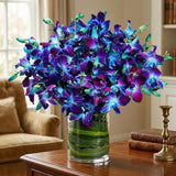 10 Blue Orchids Arrangement in Cylindrical Glass