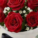 12 Red Roses Bouquet in Elegant White Paper