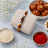 Rudraksh Silver Bead Rakhi with Gulab Jamun