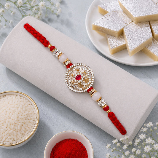 Kundan Floral Medallion Rakhi with Kaju Katli
