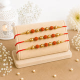 Set of 3 Rudraksha Rakhi with Kaju Roll & Dairy Milk Chocolates | Multi-Brother Gift