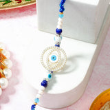 Evil Eye Concentric Circle Rakhi with Gulab Jamun