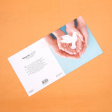 Pack of 50 Dove in Hands Greeting Card