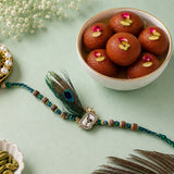 Peacock Feather Charm Rakhi with Gulab Jamun