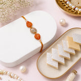 Shell Leaf Bead Rakhi with Kaju Katli