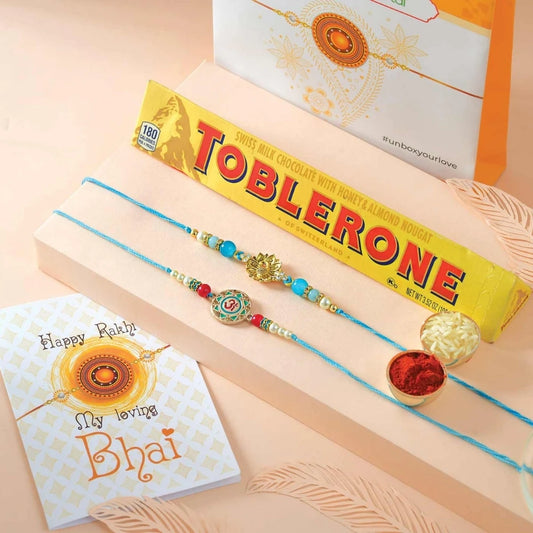 Om and Peacock Rakhis with Toblerone
