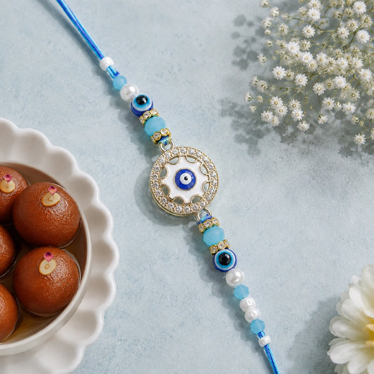 Evil Eye Wheel Charm Rakhi with Gulab Jamun