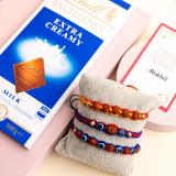 Graceful Rudraksha Rakhi with Lindt Extra Creamy Milk Chocolate