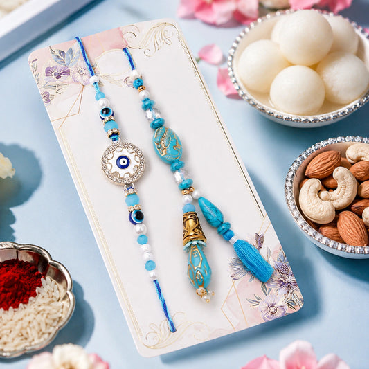 Studded Evil Eye Bhaiya Bhabhi Rakhi Set with Rasgulla & Dry Fruits