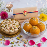 Divine Ganesha Rakhi with Motichoor Laddoo & Pistachios | Festive Hamper