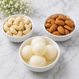 Studded Evil Eye Bhaiya Bhabhi Rakhi Set with Rasgulla & Dry Fruits