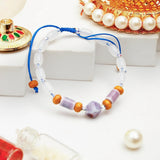 Violet Bead Bracelet Rakhi with Besan Laddo