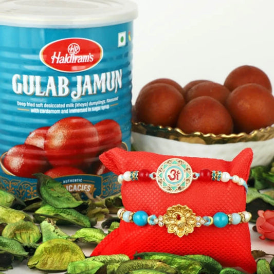 Om and Peacock Rakhis with Gulabjamun