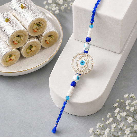 Evil Eye Concentric Circle Rakhi with Kaju Roll