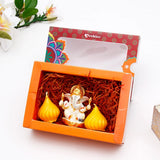 Ganesha Idol with Set of 2 Modak Diyas - Yellow
