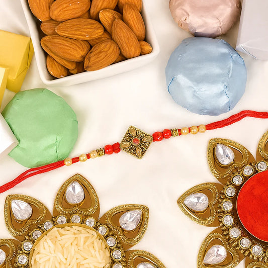 Antique Kundan Rakhi with Almond and Chocolates