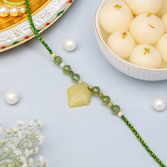Olive Leaf Crystal Rakhi with Rasgulla