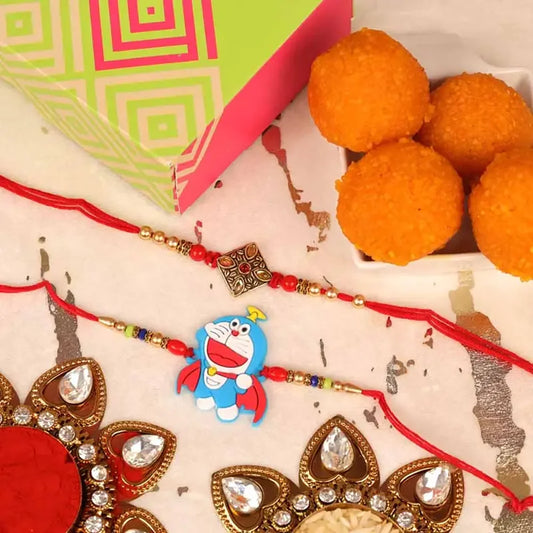 Antique Kundan and Doremon Rakhi with Motichoor Laddoo Set of 2