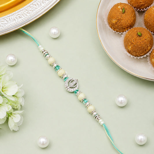 Khanda Pastel Green Rakhi with Besan Laddo