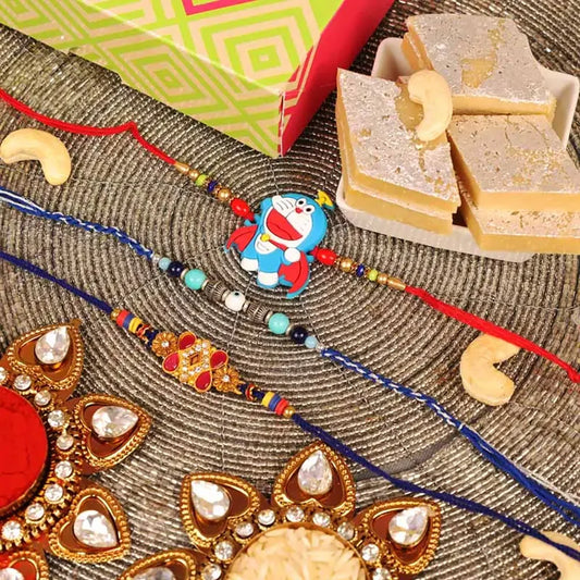 Evil Eye Kundan and Doremon Rakhi with Kaju Katli Set of 3