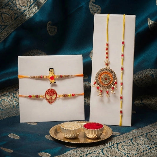 Designer Family Rakhi Set With Kaju Katli And Ferrero Rocher