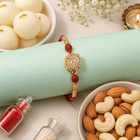 Rudraksha Kundan Medallion Rakhi with Rasgulla & Dry Fruits