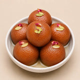 Silver Peacock Medallion Rakhi with Gulab Jamun & Dry Fruits
